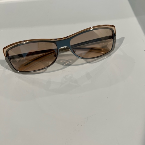 Gucci sunglasses.